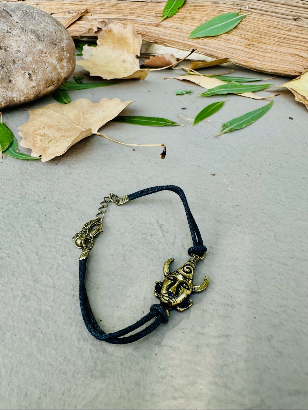 Antique Brass Horned Mask Bracelet - Black Cord